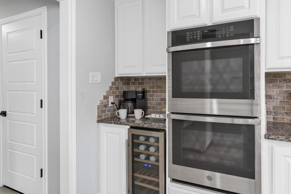 Fully Equipped Kitchen | Modern Appliances, Spacious Counters & Stylish Island Seating