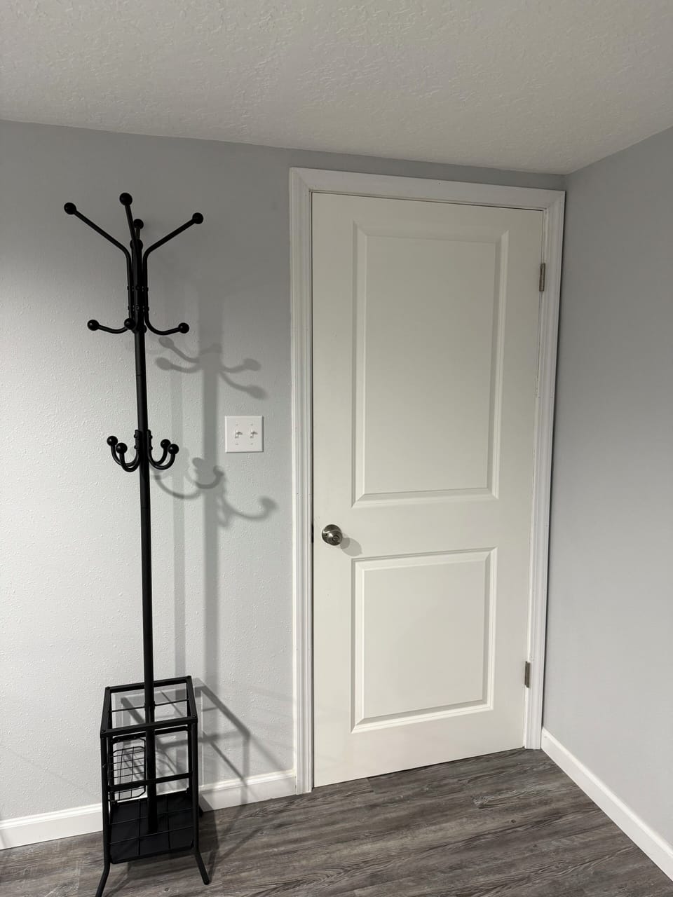 Entrance into space with coat rack and now a shoe rack for muddy/snowy boots!