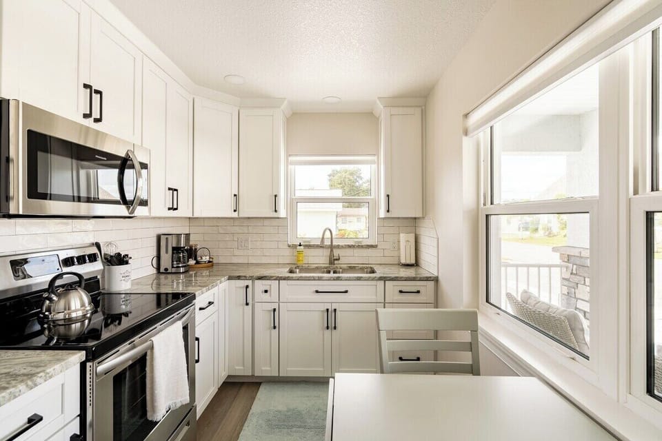 Kitchen and dining table with bright sunlight!
