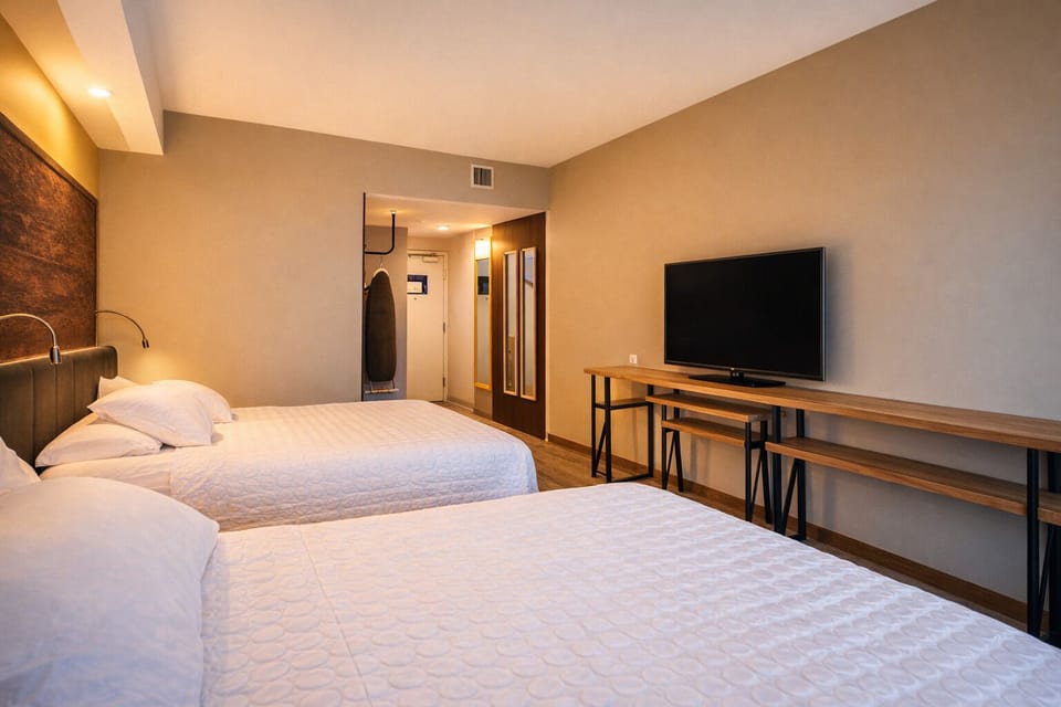 Kick back with big-screen entertainment and a roomy work desk.