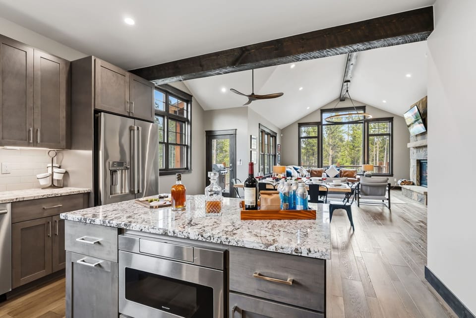 Kitchen: Main floor, drip coffee maker, Keurig, toaster, cooking utensils, tableware