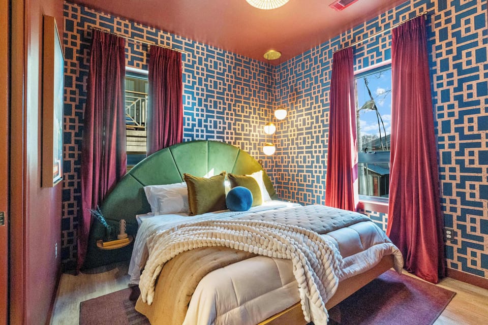 The rich tapestry of this king room is unmatched.