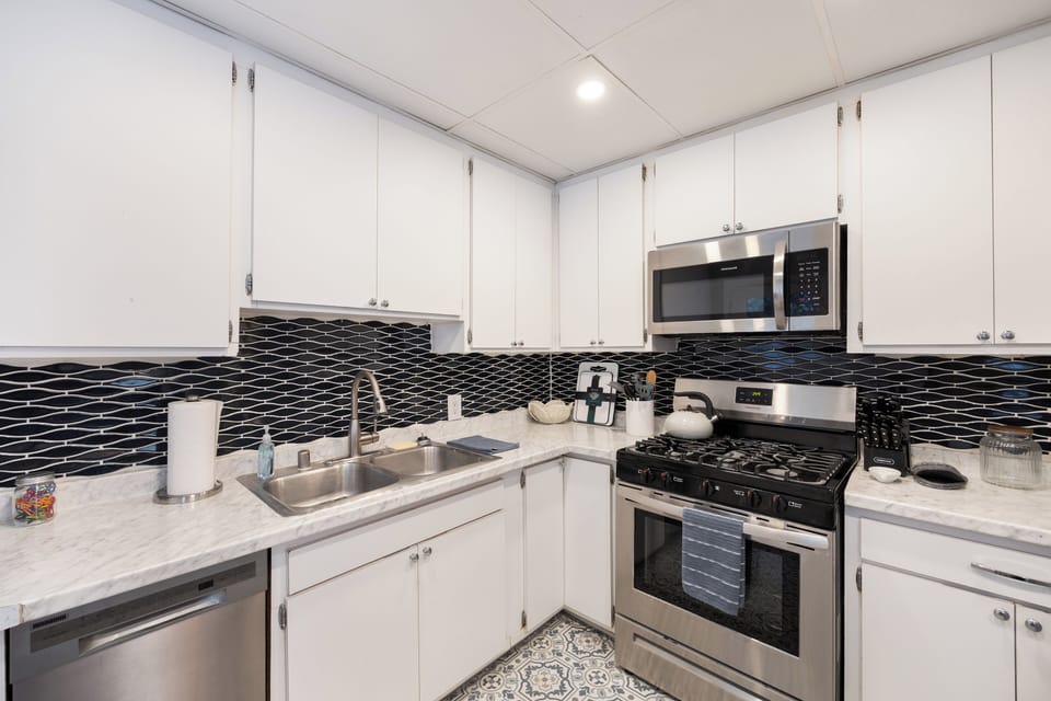Reliable appliances and ample counter space for meal prepping in the kitchen.