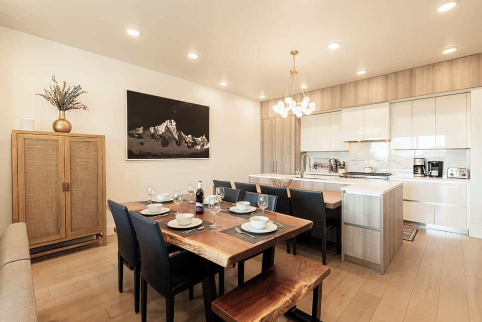 Wood dining table with seating for up to eight