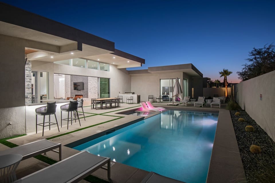 Dive into luxury! The private, lit pool and built-in hot tub are ready for an evening swim and ultimate relaxation.