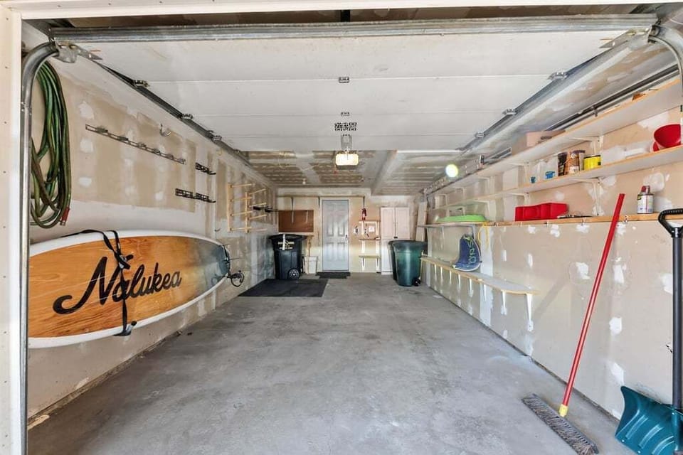 Store your gear in this spacious, organized garage with plenty of shelving and hooks for all your vacation equipment.