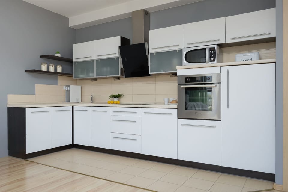 The fully equipped kitchenette includes everything you need for a home-cooked meal.