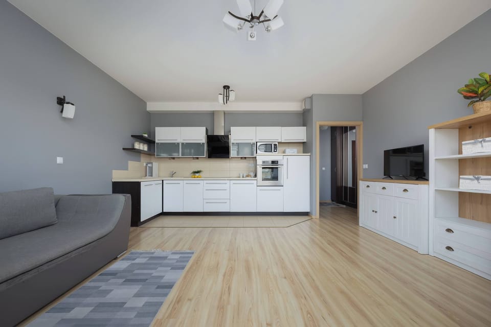 The kitchenette's practical layout maximizes space and functionality.