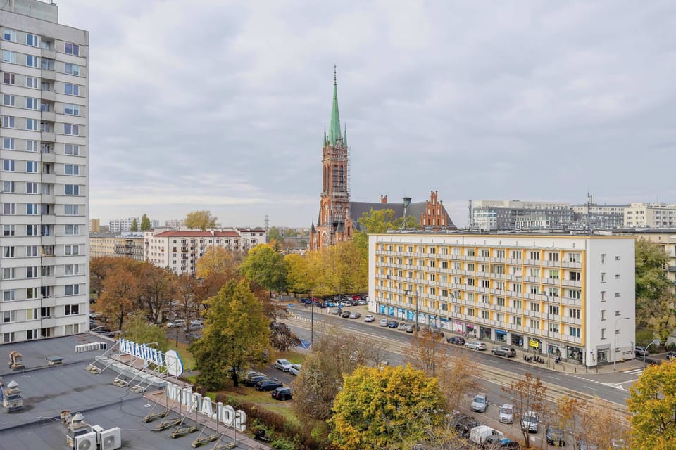 Panoramic view with church spire – Beautiful city skyline with historic architecture.