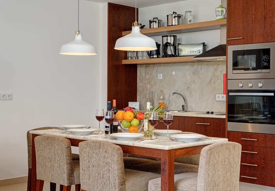 Lounge together in an airy suite made for slow evenings.