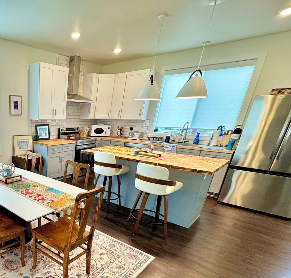 Full kitchen w/all cooking, food storage, and dining essentials. 