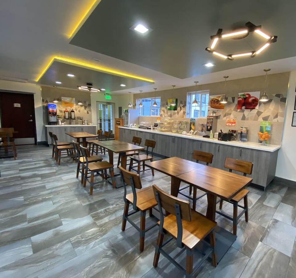 Gather for coffee and conversation under warm, modern lighting.