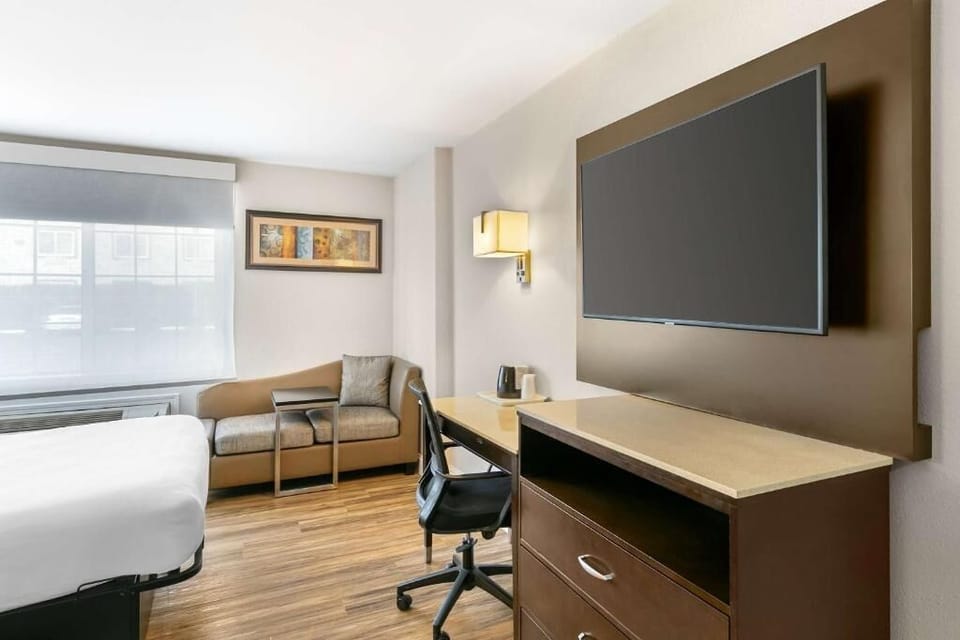 Catch up on emails, then relax with a large-screen TV.