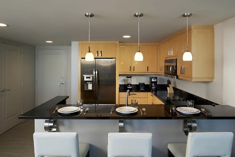 Start mornings with coffee in this bright, modern kitchen.