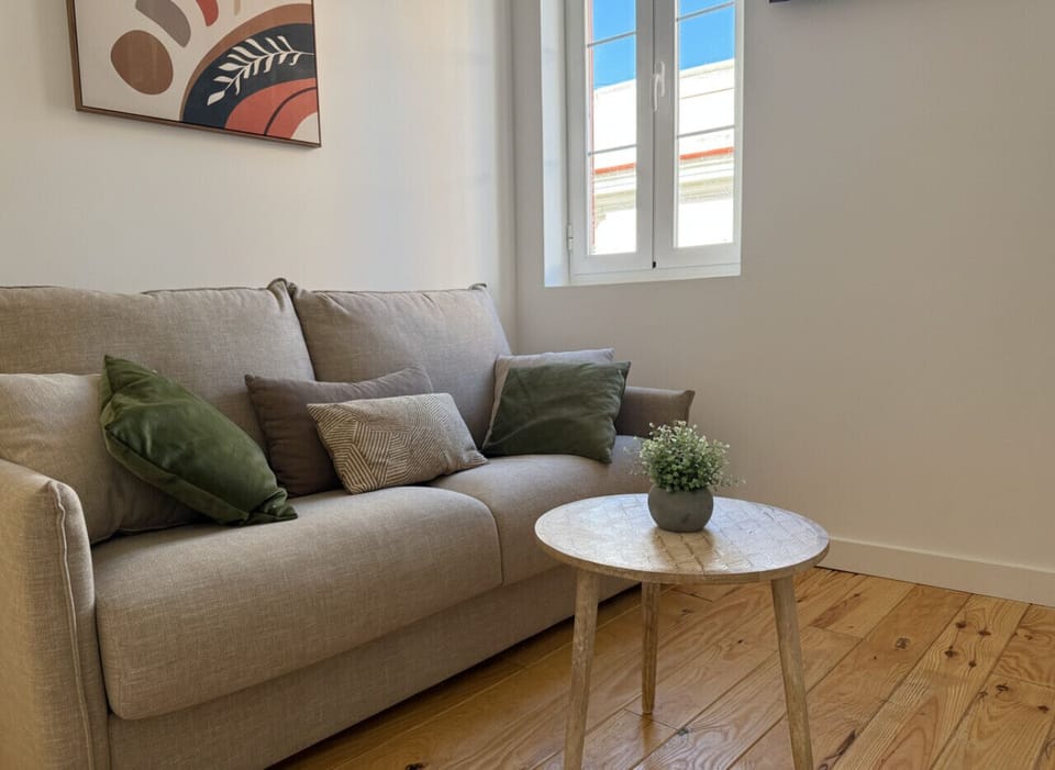 Open-plan living area with kitchenette and seating