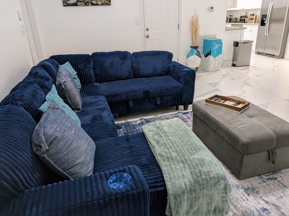 Modern décor with tropical accents & inviting ambiance.