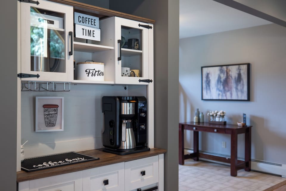 Coffee Bar with Coffee, Tea, Cream, and Sugar.