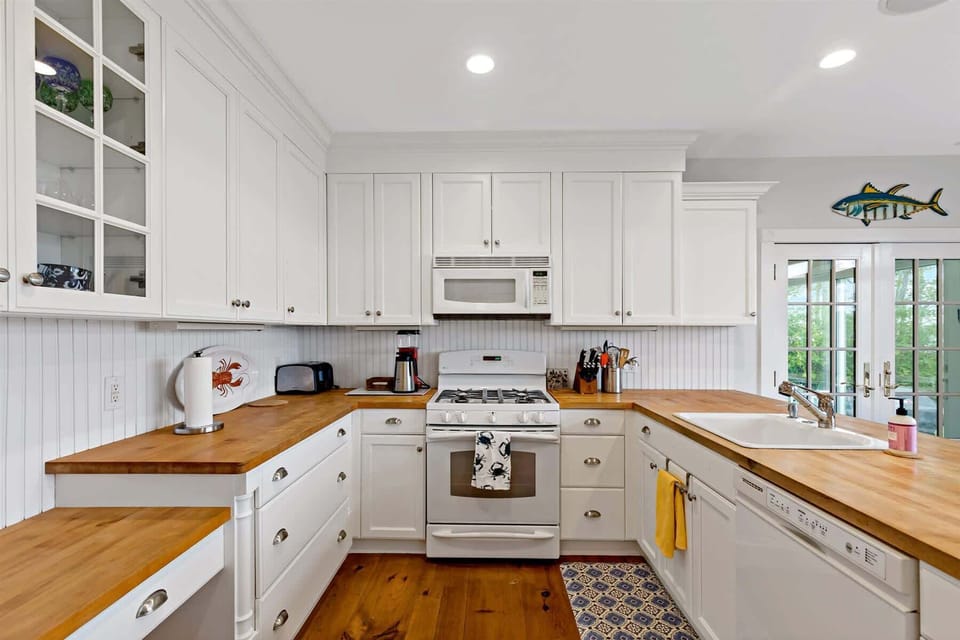 Fully equipped kitchen stocked with premium appliances and all the cookware you need to prepare classic Cape Cod meals
