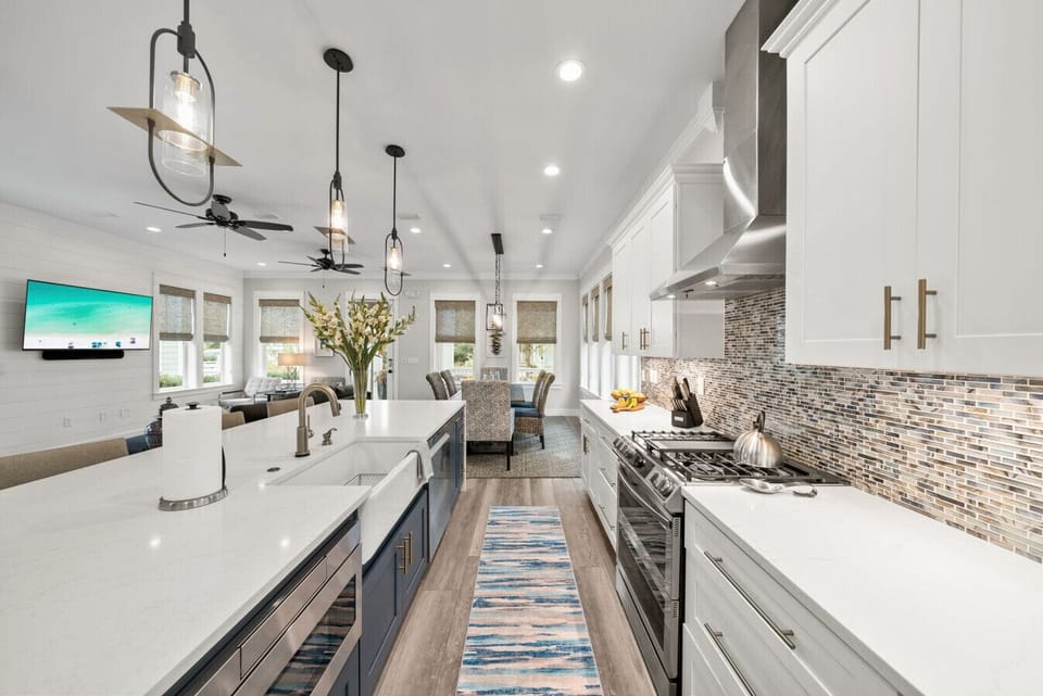 Spacious gourmet kitchen with high end appliances and fully stocked