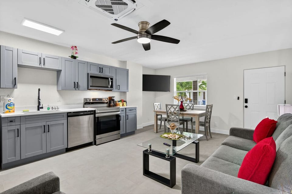 Spacious open-concept living area connecting the kitchen & dining space.