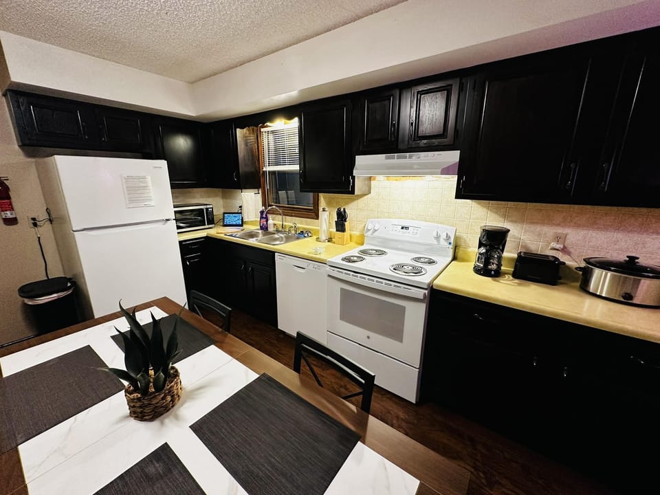 Cozy kitchen with modern appliances and warm lighting