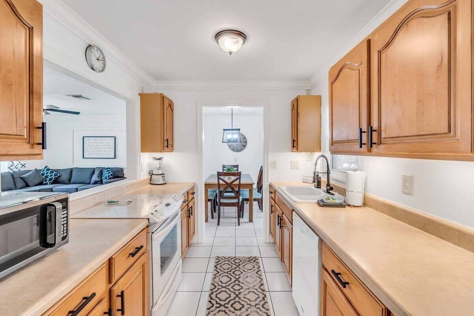Beautiful, clean appliances and spacious countertops for cooking.