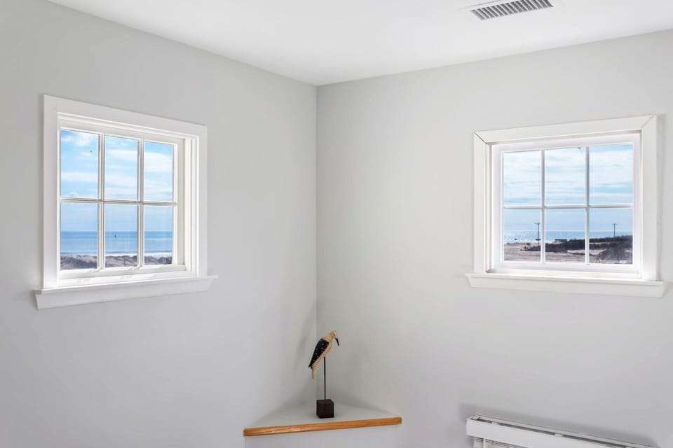 Catch glimpses of the iconic Cape Hatteras Lighthouse nearby—a must-see landmark during your OBX stay.