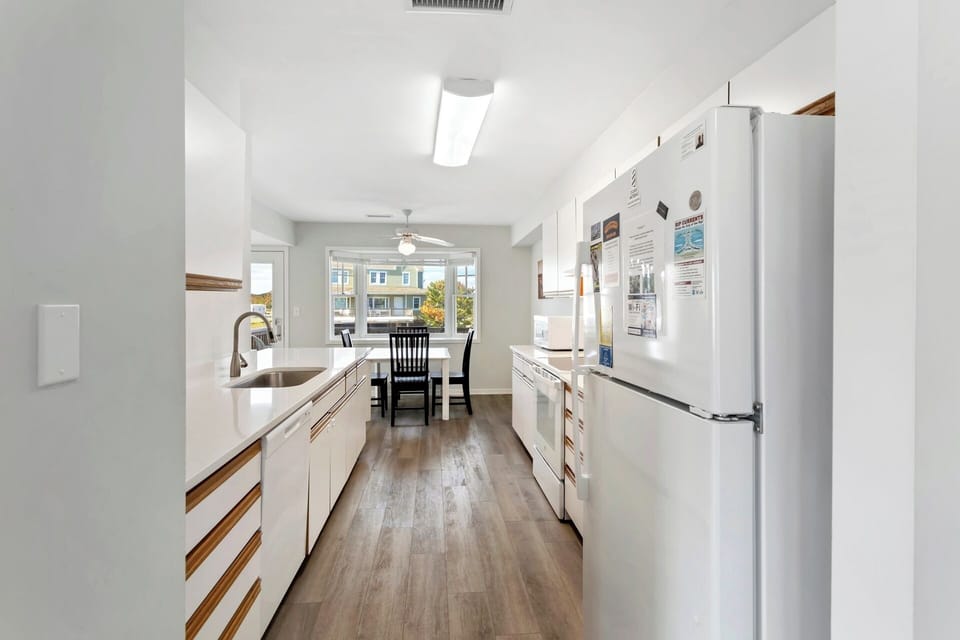 Prepare your favorite meals in the well-stocked kitchen with modern appliances, plenty of counter space, and all the essentials.
