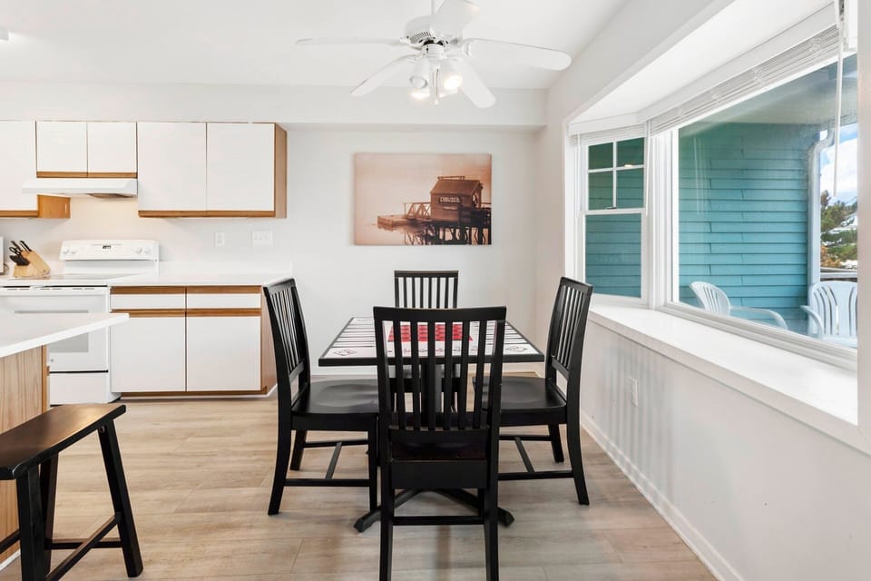 Have some fun at the game table near the kitchen with checkers and a snack!