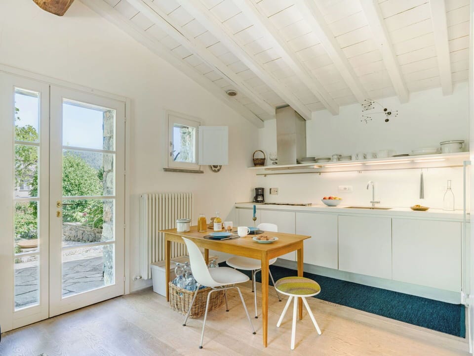 Furniture, Interior Design, Flooring, Wall, Kitchen, Wood, Countertop, Ceiling, Floor, Room