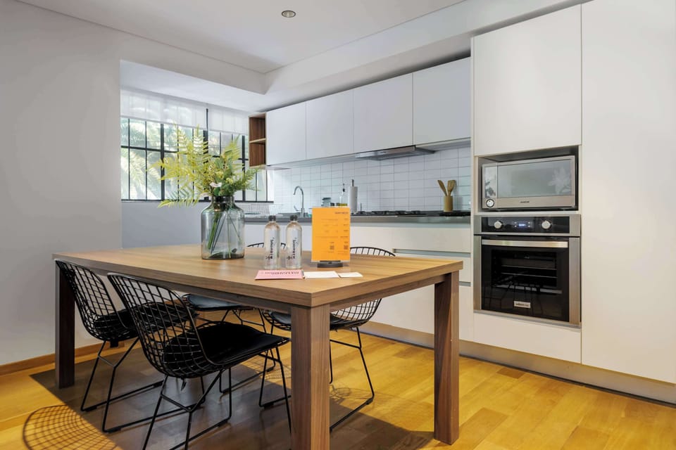 Contemporary dining space with stylish lighting and décor.