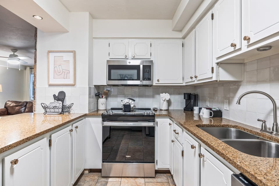 The open design allows you to cook, dine, and relax all in one welcoming space.