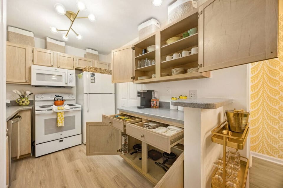 Kitchen is stocked with everything needed to prepare a typical dinner.