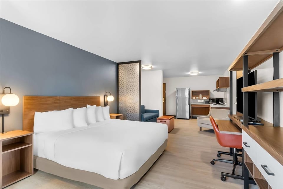 Settle in with a roomy suite and easy in-room dining.