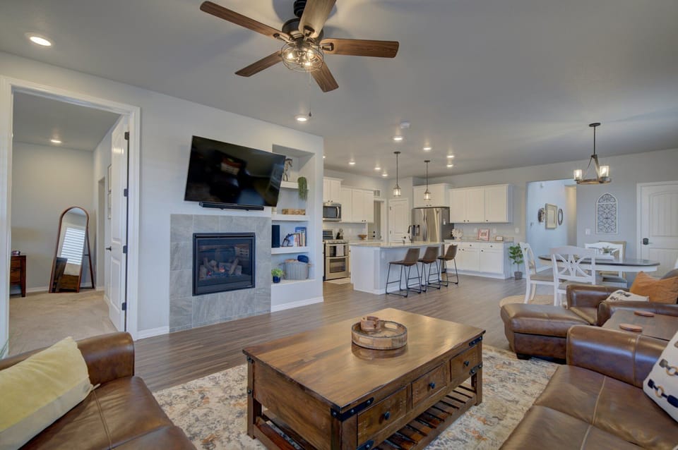 Hardwood floors and an open-concept layout that flows seamlessly from kitchen to living room