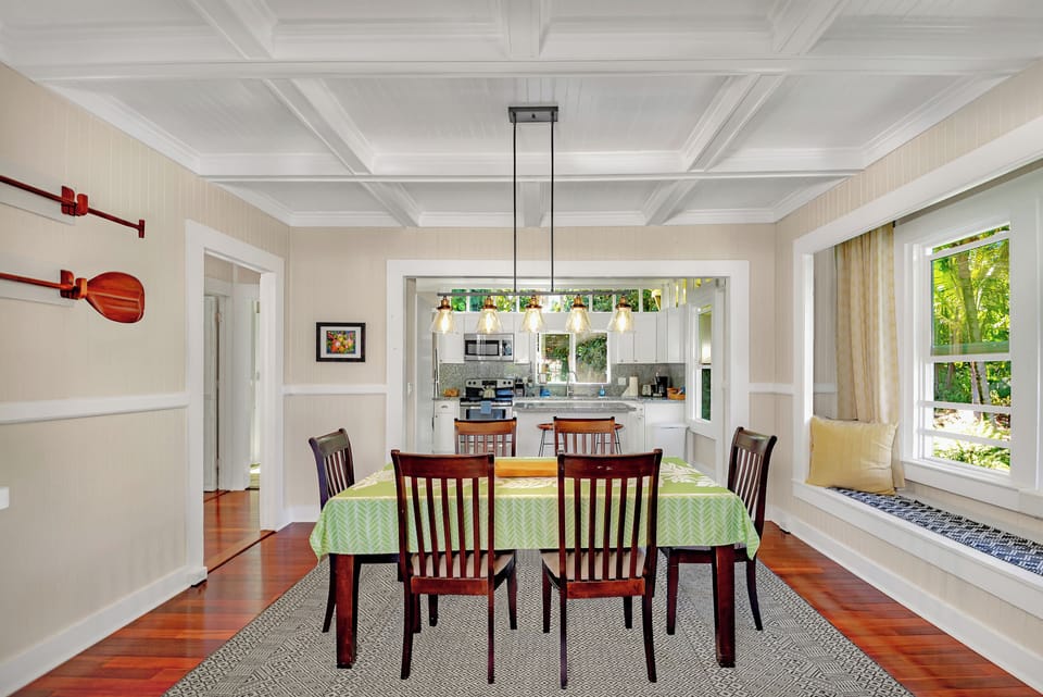 Dining room is between kitchen and living room.