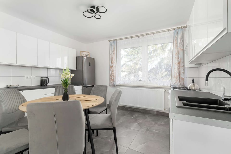 Prepare meals with ease in the kitchen's functional layout.