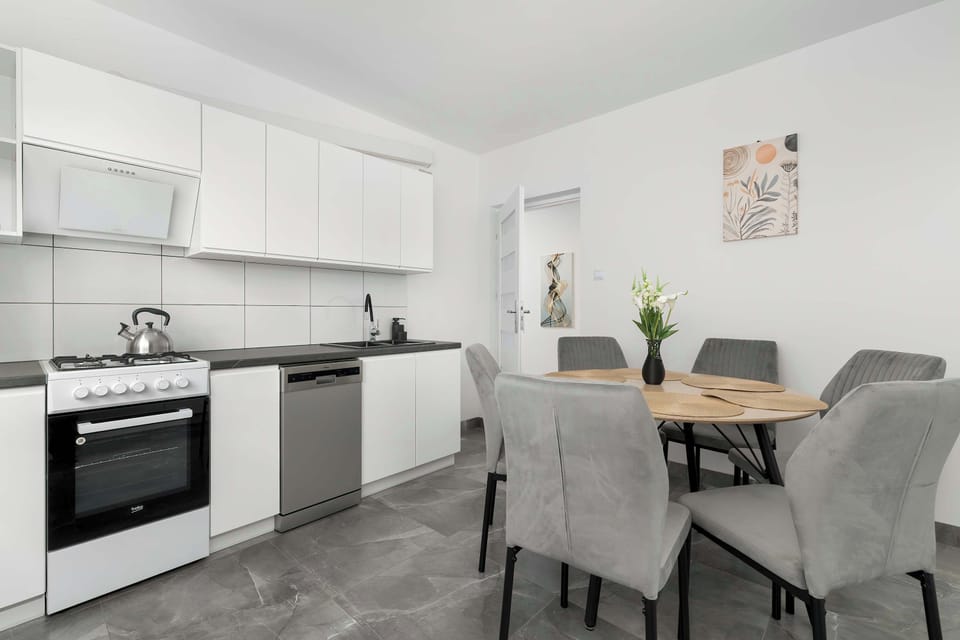 The kitchen is fully equipped with high-quality appliances for all your culinary needs.
