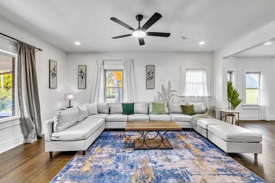 Bright and inviting living area with comfortable seating and natural light