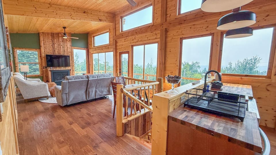 A flight of stairs connects the upper level to the lower level.