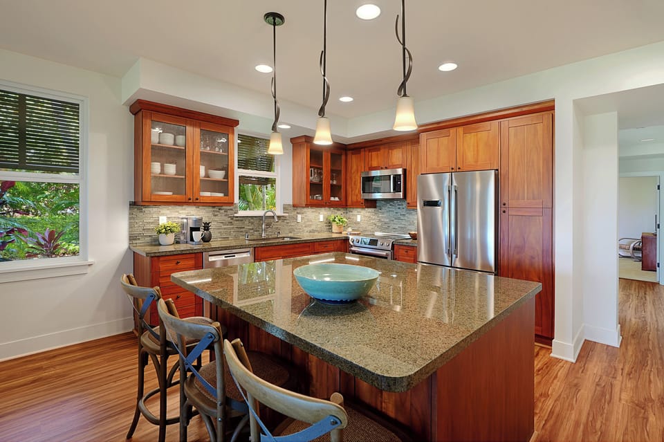 Chef‑ready kitchen with clean lines, modern appliances, and ample counter space for preparing island meals.