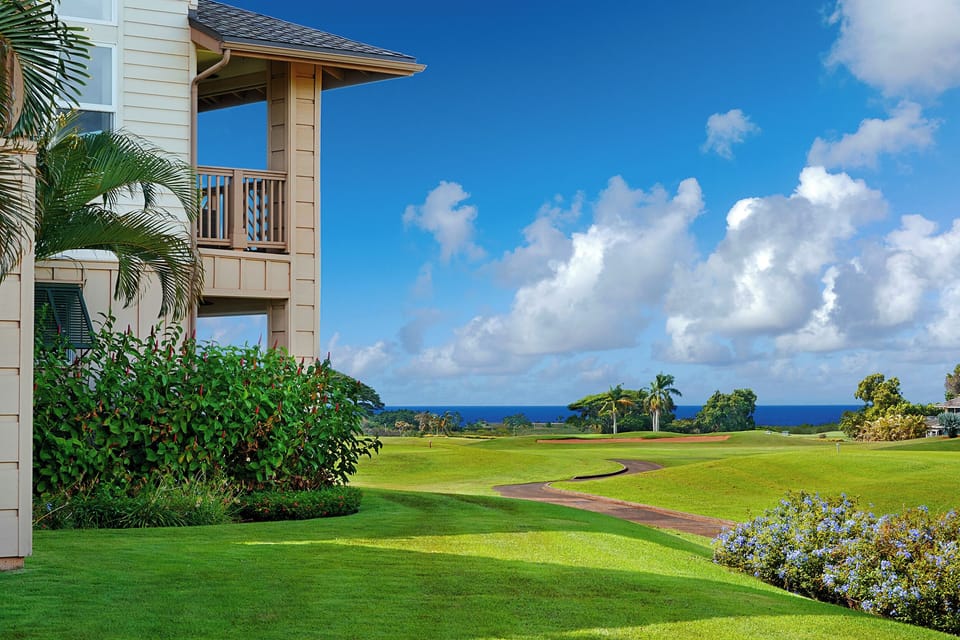 Lush garden views and serene green fairways just outside your windows — tropical surroundings await.