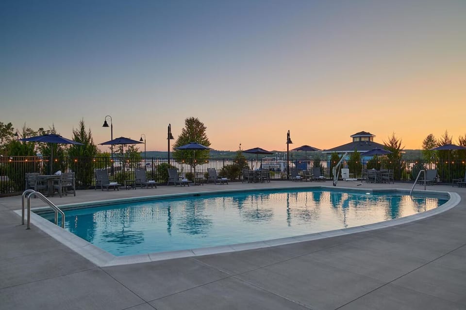 Unwind at sunset with a shimmering poolside escape.
