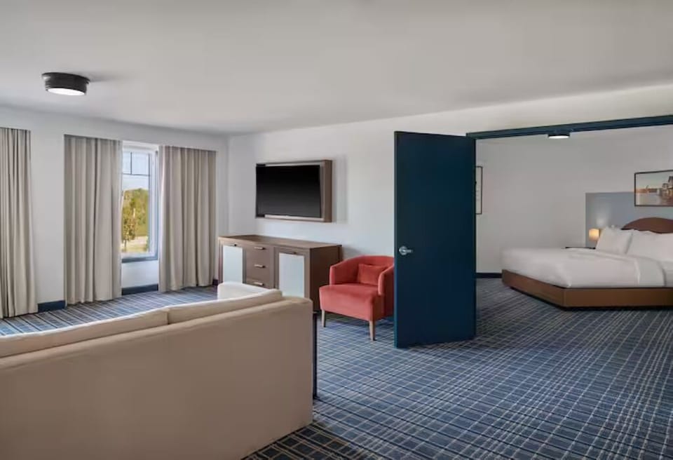 Stretch out in your spacious suite with separate sleeping area.