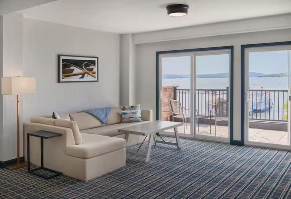 Unwind on the comfy sofa with sparkling bay views.