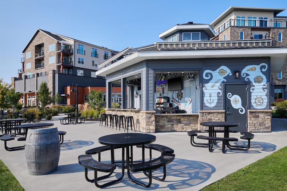 Unwind outdoors with casual tables, fresh air, and views.