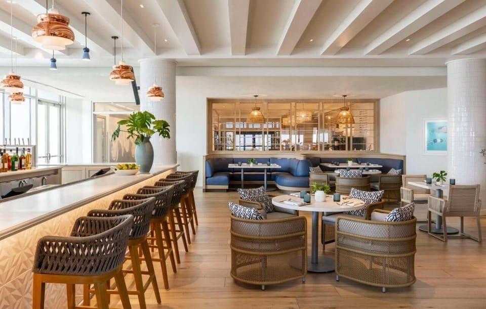 Unwind with airy seating and coastal-chic conversation corners.