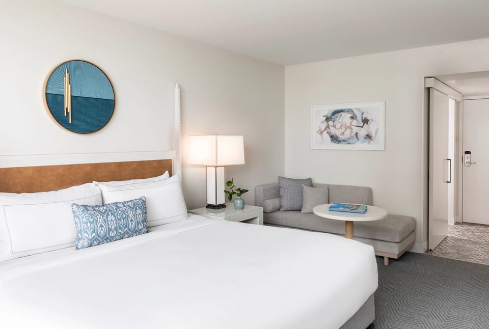 Settle into a crisp king bed with cozy lounge nook.
