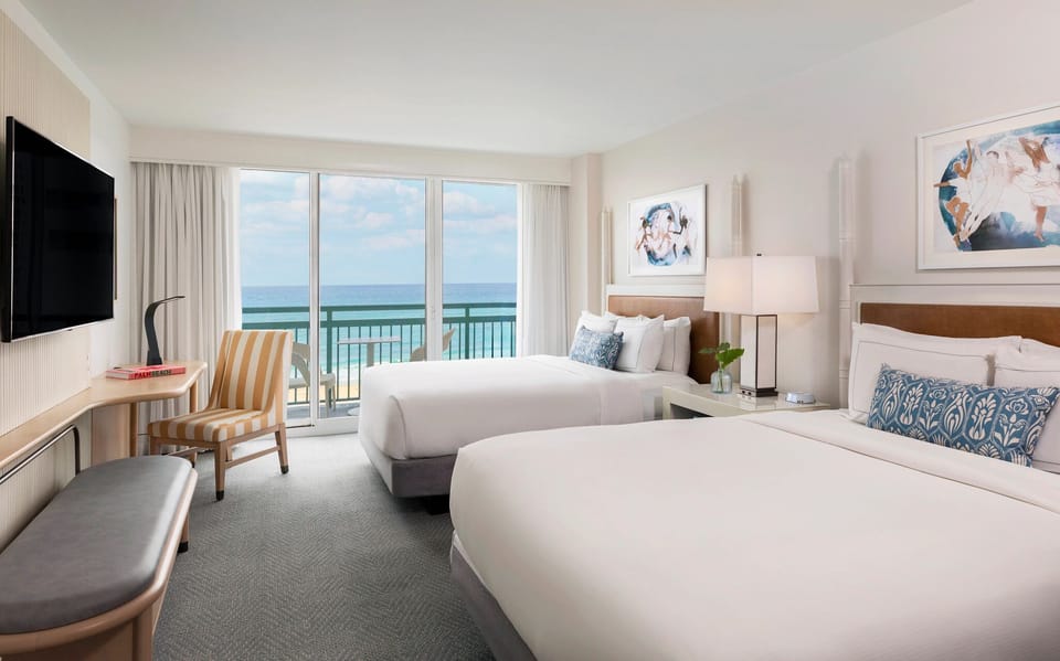 Wake up to ocean views from crisp, airy double beds.