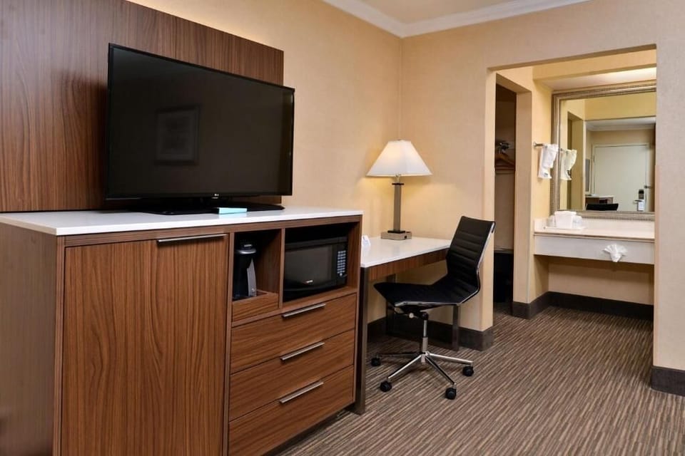 Refresh your routine with a roomy desk and big-screen TV.